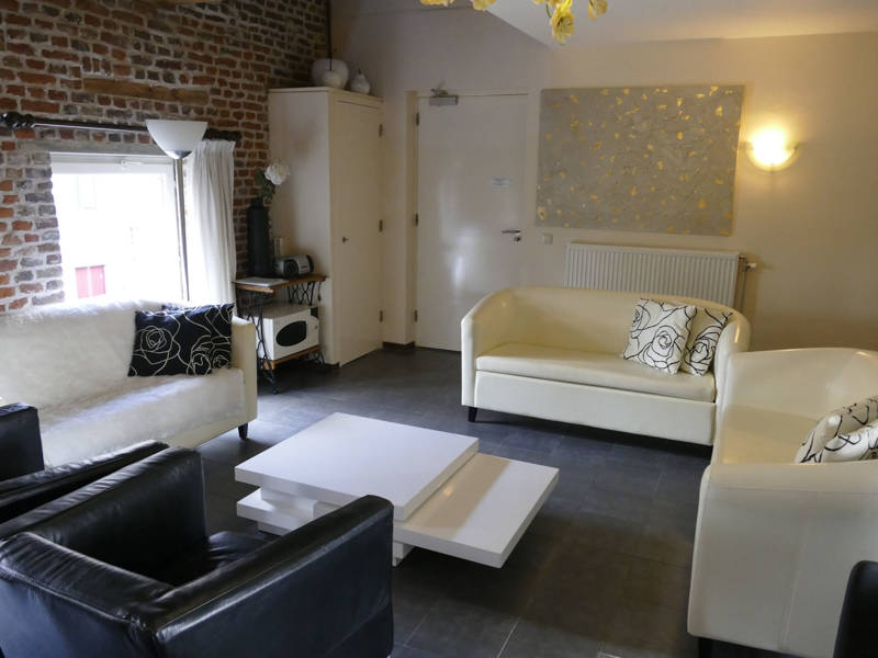 Woonkamer groepsaccommodatie Eijsden 8 personen
